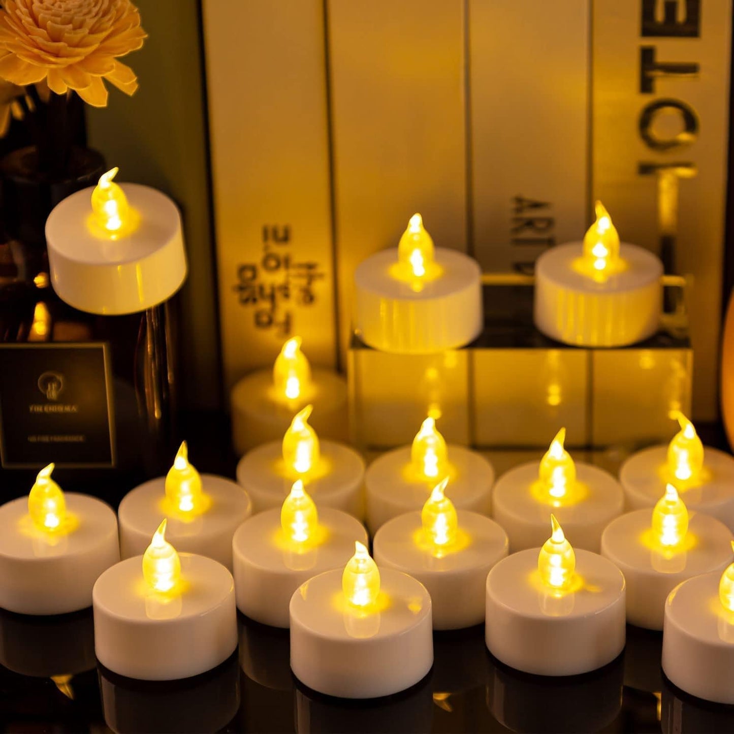 Tappovaly Battery Operated LED Tea Lights:24 Pack Flameless Votive Candles Lamp Realistic and Bright Flickering Long Lasting 200Hours for Wedding Holiday Party Home Decoration (Warm Yellow)