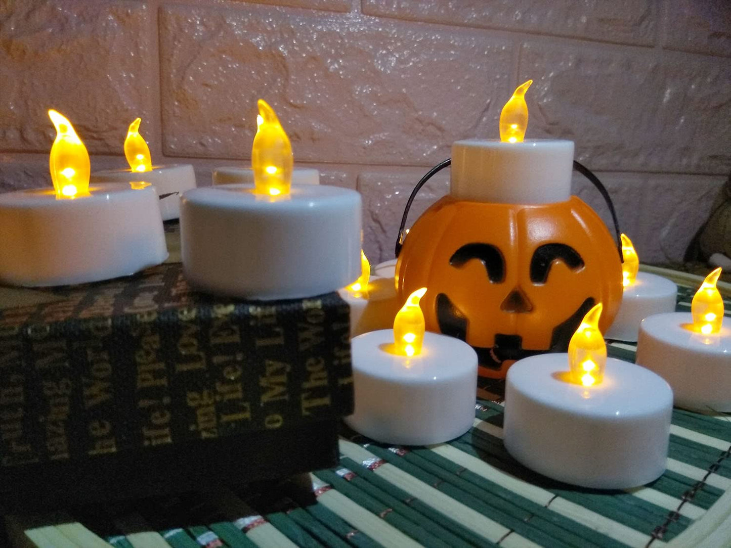 YIWER Tea Lights LED Tea Light Candles 200 Hours Pack of 200 Realistic Flickering Bulb Battery Operated Tea Lights for Seasonal Festival Celebration Electric Fake Candle in Warm Yellow(2 * 100)