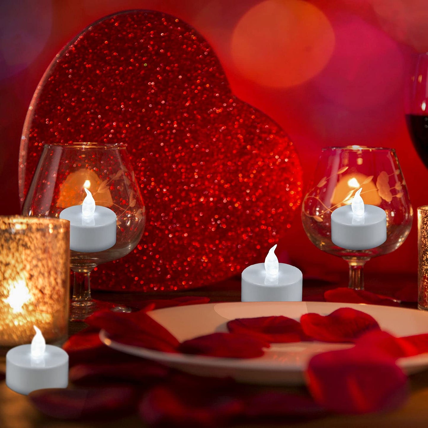 YIWER 100pcs Flameless Tea Lights Candles Realistic LED Flickering Operated Pumkin LED TeaLights Candles Long Lasting Electric Fake Candles Decoration for Party and Gifts Ideas