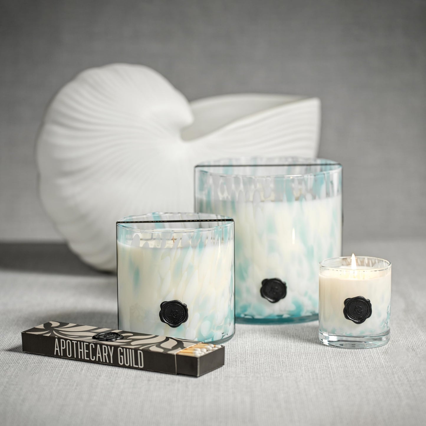 Zodax Apothecary Guild Apothecary Guild Opal Glass Five-Wick Candle Jar 8 in x8 in 250 Hours Burn Time Aqua Blue Sunset Beach